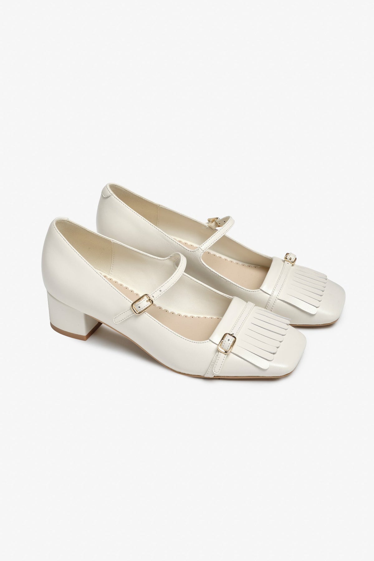 Martie Fringe Loafer Heel - Cream